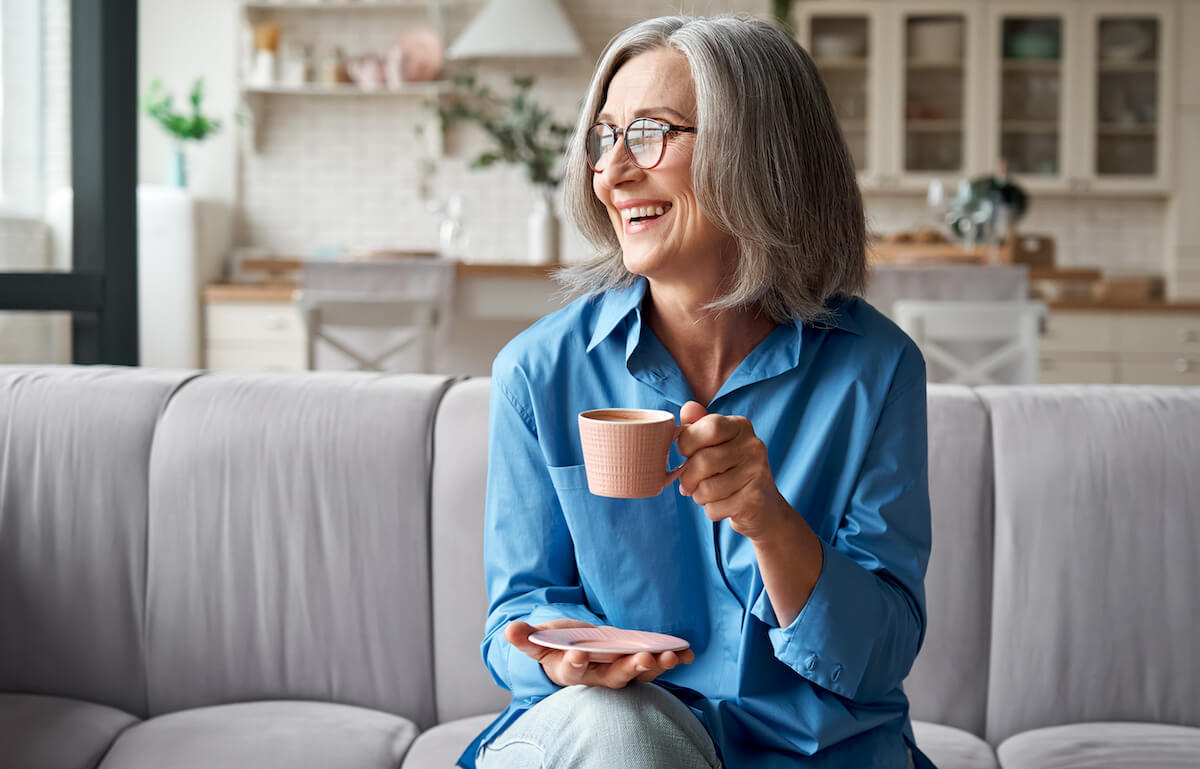 happy senior woman in her home