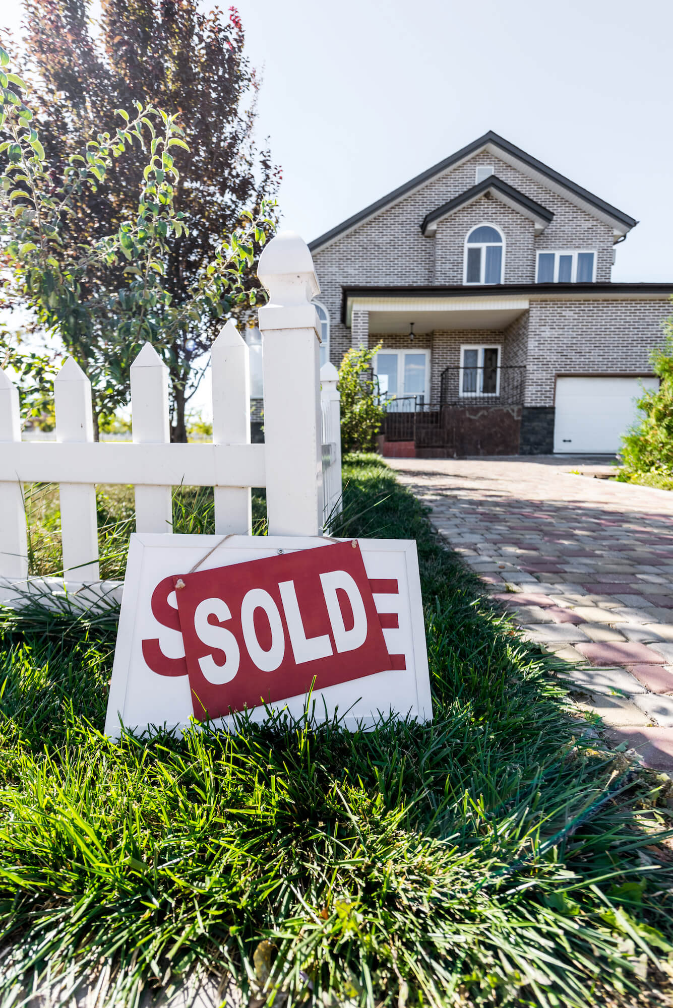 A home with a sold sign.