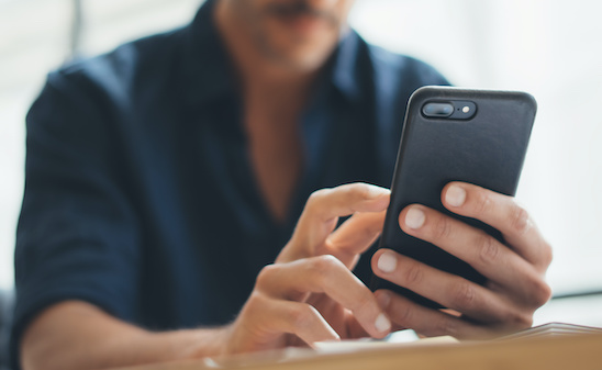 Man holding cell phone