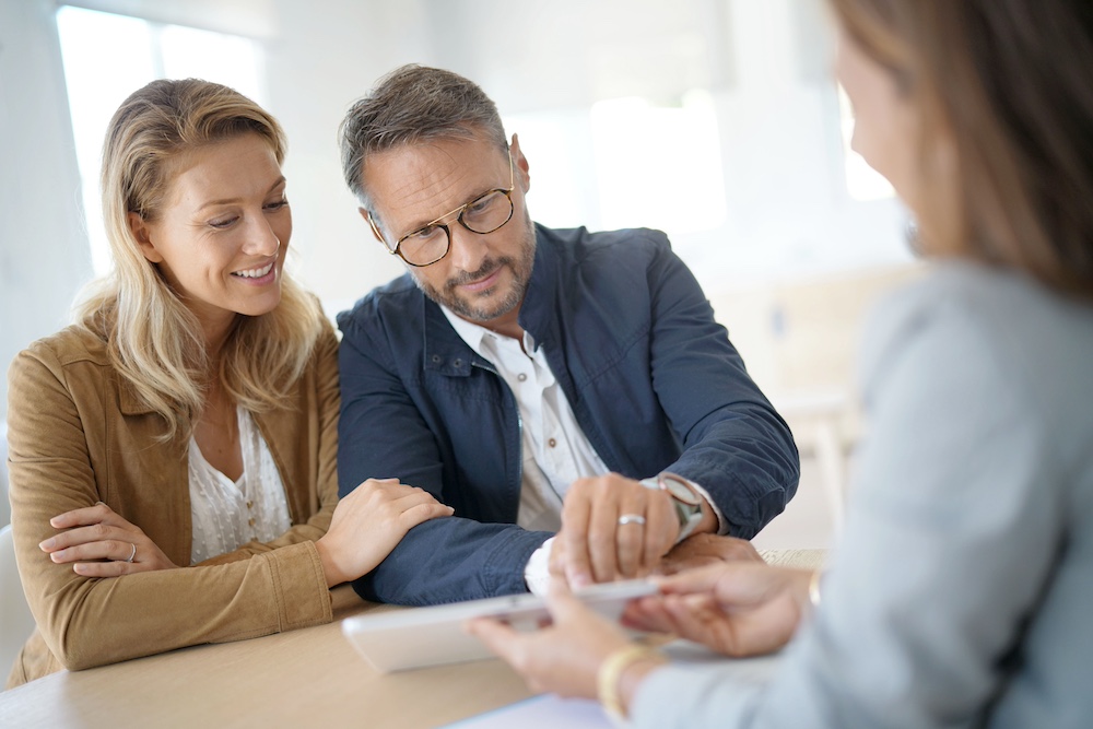 Couple meeting with agent